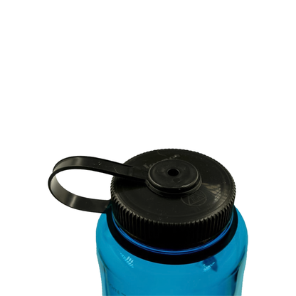 Close-up of blue 48oz Nalgene bottle cap with black lid, made from recycled plastic, suitable for hiking and daily hydration needs.