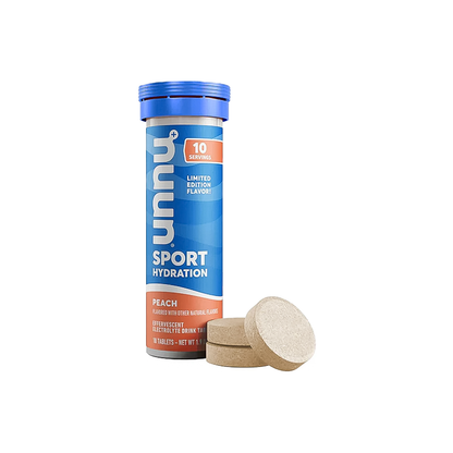 Nuun Sport hydration supplement bottle in peach flavor on a white background, highlighting its low-calorie, electrolyte-rich formula.