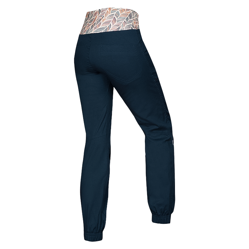 Stylish women's climbing blue and patterned pants, showcasing the comfort and flexibility of the Ocun Sansa for outdoor adventures.