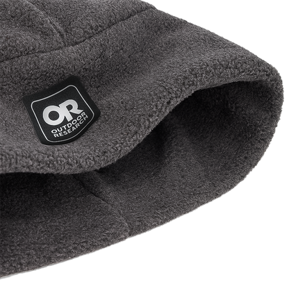Outdoor Research logo on a gray beanie, ideal for winter sports, offering lightweight warmth and UPF 50+ sun protection.