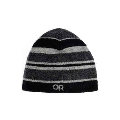 Lightweight Outdoor Research Spitsbergen Beanie in black and white stripes with moisture-wicking and windproof features, perfect for winter adventures.