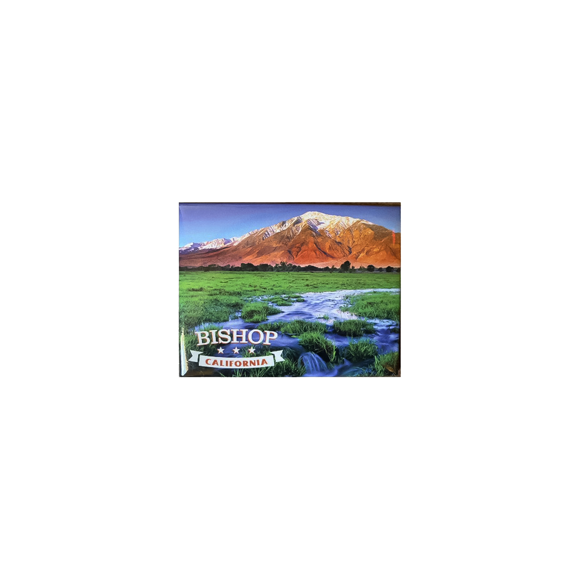 A magnet featuring a scenic mountain landscape with a stream, highlighting the beauty of the Eastern Sierra region.
