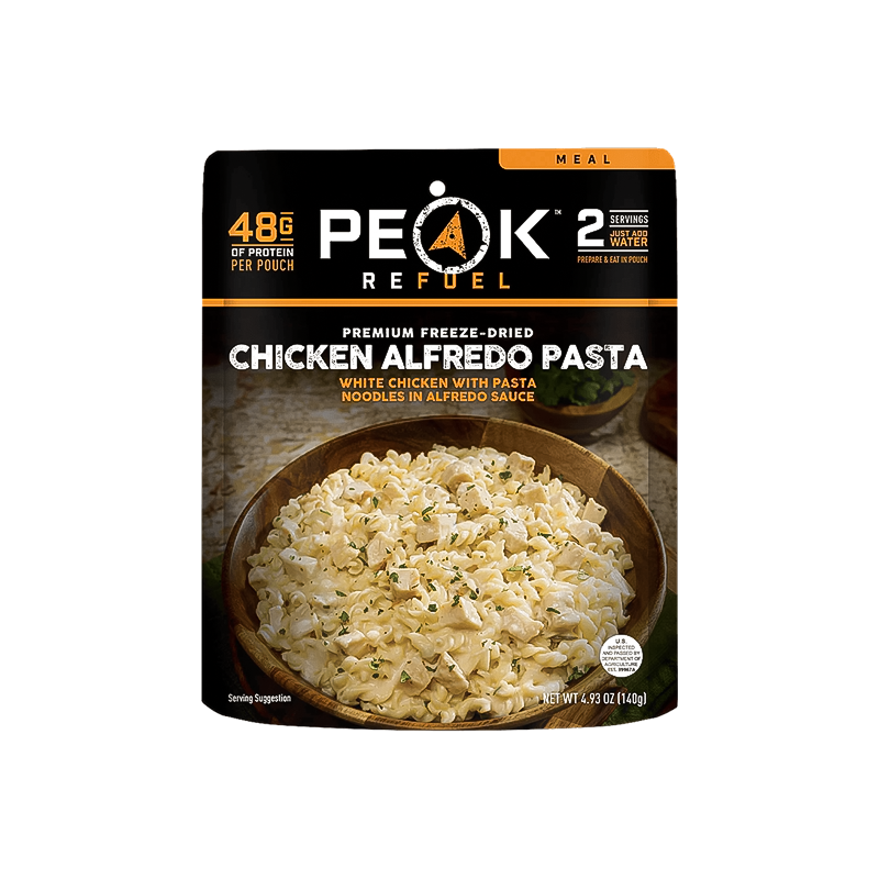 Peak Refuel chicken alfredo pasta, a protein-rich dehydrated meal with real meat, ready in under ten minutes.