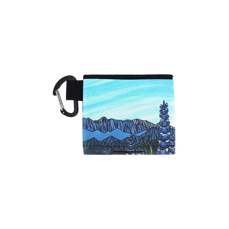 A blue and black minimalist wallet with a mountain scene for secure card and cash storage.