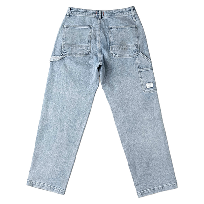 A pair of men's utility jeans featuring side pockets, double-knee construction, and a relaxed fit for comfort and durability.
