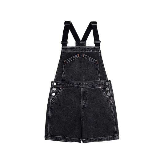 Black overall bib shorts with adjustable straps, designed for comfort and mobility in mountain biking and gravel rides.