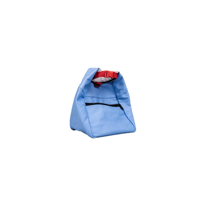 Blue chalk bucket with red and white striped lining, featuring a magnetic closure and a zippered pocket for climbing essentials.