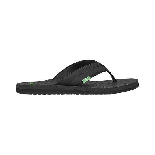 Black flip flop sandals with green trim and a cushioned yoga mat footbed.  