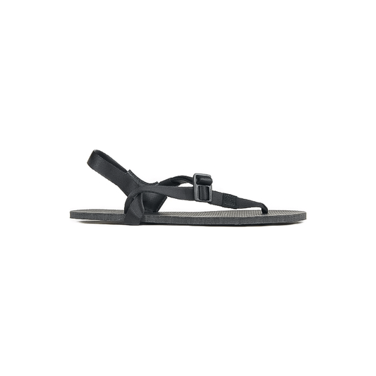 Black leather Shamma sandal with toe buckle, designed for comfort in casual and active settings.  