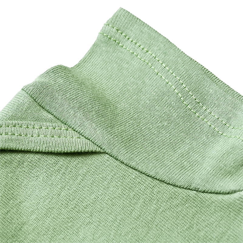USA-made baby green bodysuit sleeve.