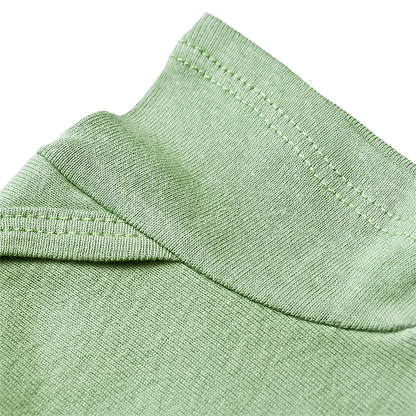 USA-made baby green bodysuit sleeve.