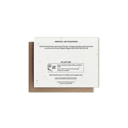 Eco-friendly greeting card featuring a bat and holly design on plantable paper with herb seeds back cover.