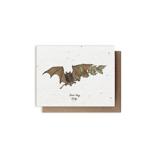 Bat-themed greeting card with holly, printed on plantable paper with herb seeds.