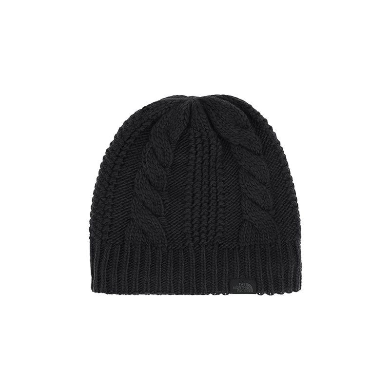 Cozy North Face cable knit beanie with a reflective logo, perfect for winter outings.