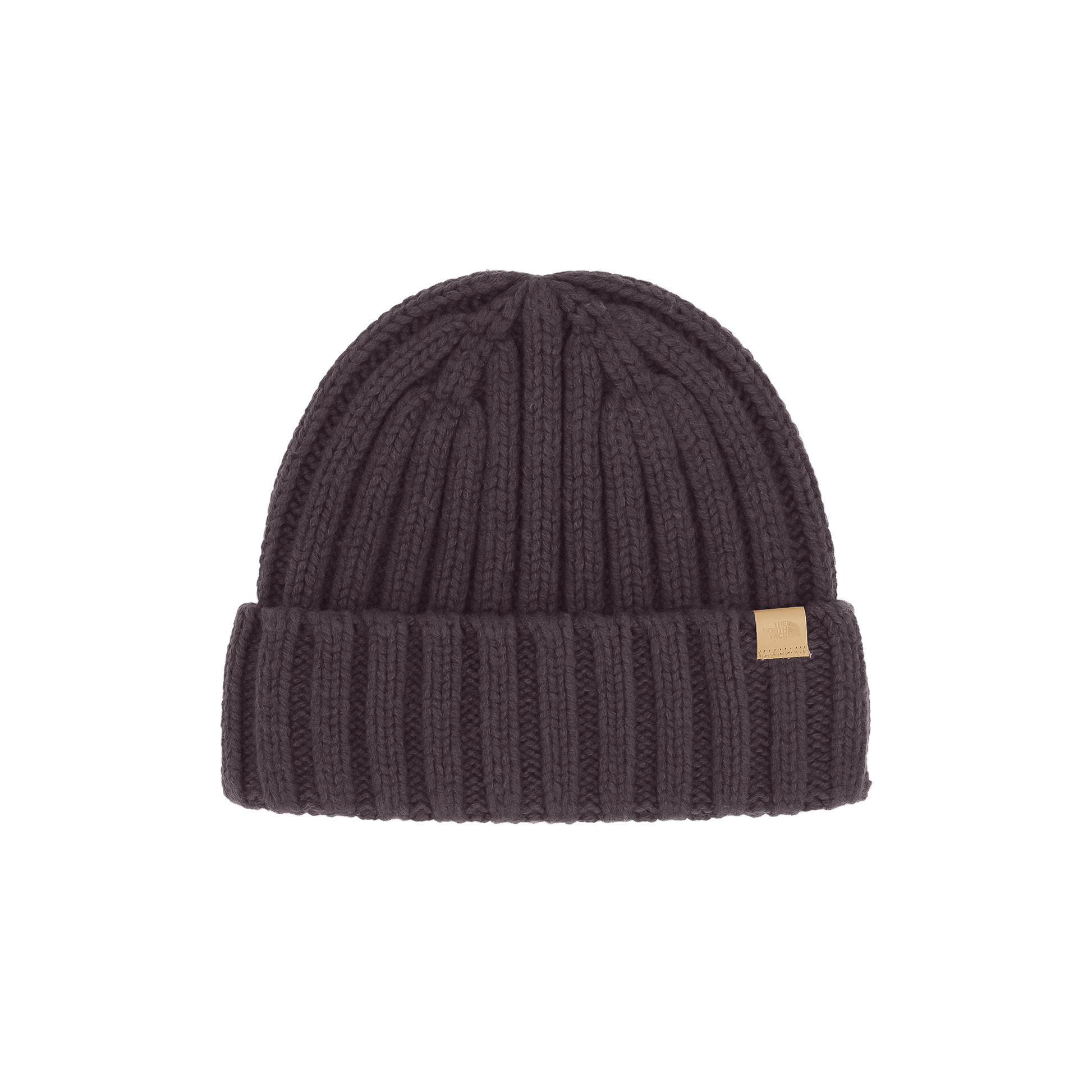 Deep purple ribbed beanie made of 100% merino wool, showcasing a textured knit and leather logo clip at the cuff.