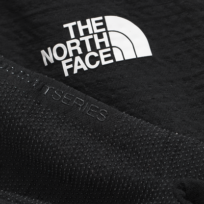 The North Face logo on the gloves, highlighting outdoor performance.