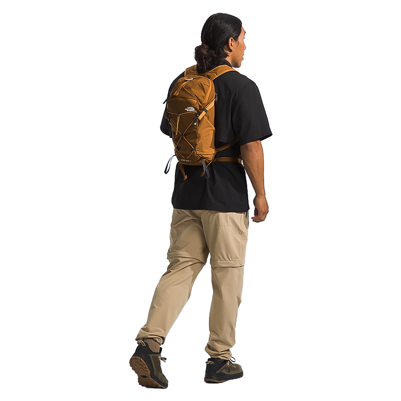 brown north face backpack wearing The North Face Trail Lite 12 Backpack – sagetosummit