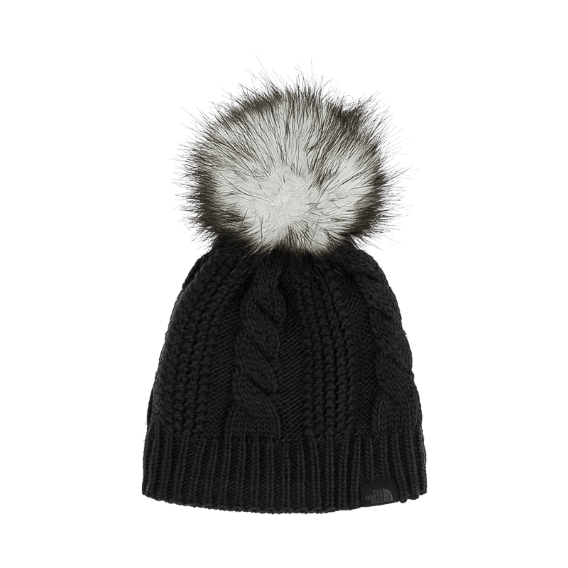 Black women's Oh Mega Fur Pom Beanie with cable knit design and large faux fur pom, made from recycled fabric.