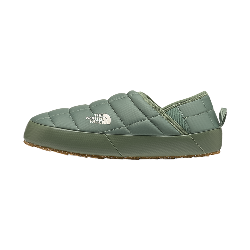 Green women's slippers by The North Face with insulated upper, cozy lining, and recycled rubber outsole.