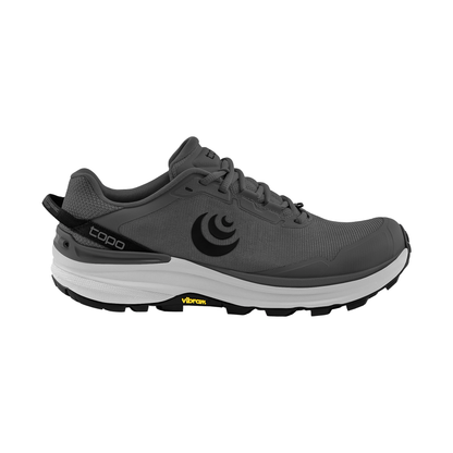 The Topo Traverse men's trail running shoe in grey and black, built for lightweight performance and quick drainage.
