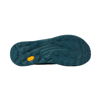 Dark teal sole of the men's Topo Ultraventure 5 shoe, emphasizing its lightweight construction and grip for road-to-trail use.