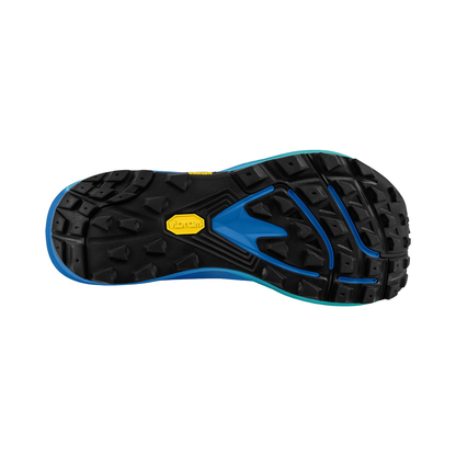 Sole of a blue Topo trail running shoe, showcasing the Vibram® Megagrip outsole for traction on various terrains.