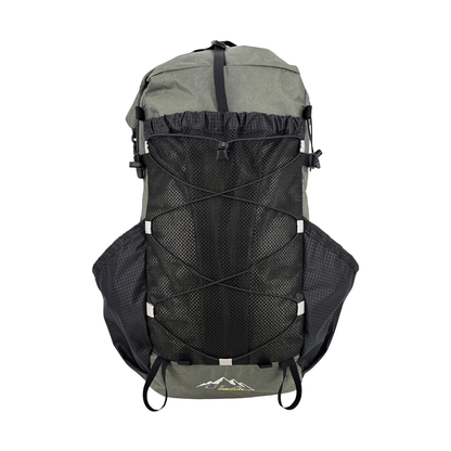 Large green and black ULA 25th Anniversary backpack with a mesh pocket, designed for comfort and high-capacity carry.