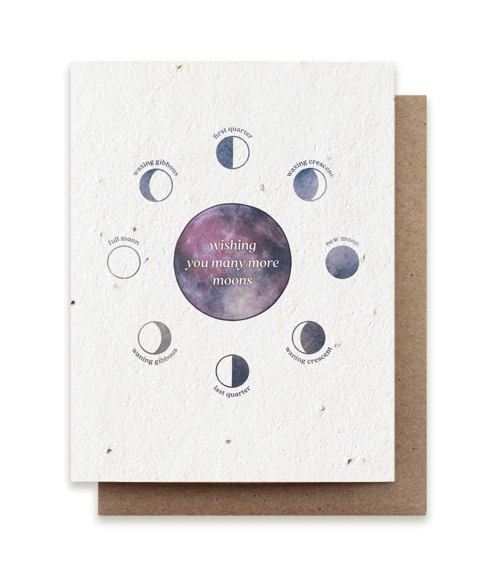 a compostable card depicting the moon phases that says "wishing you many more moons"