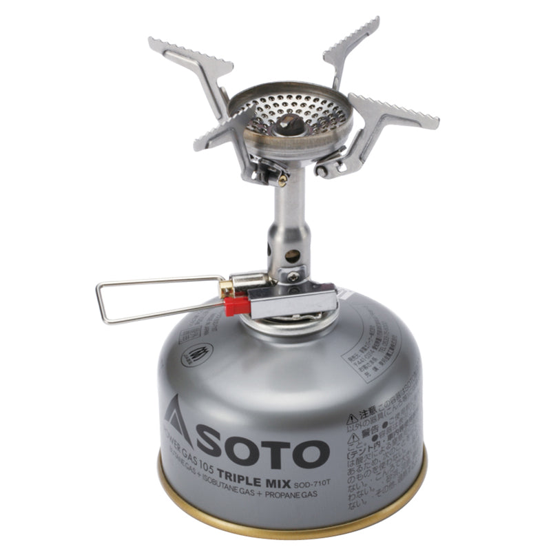 The soto amicus backpacking stove with stealth igniter mounted on a iso butane gas canister. 