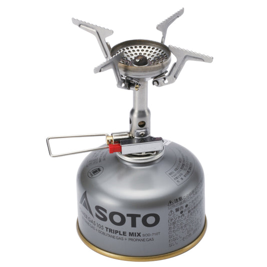 The soto amicus backpacking stove with stealth igniter mounted on a iso butane gas canister. 