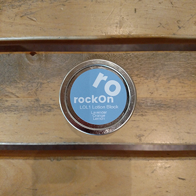 Light Blue rockOn LOL1 Lotion Block With wood background
