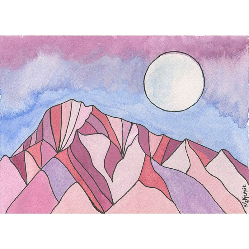 McKenzie Dale. Mount Tom postcard. The image features a beautiful mountain scene of Mt. Tom with a large, full moon prominently displayed in the sky. The moon is positioned towards the right side of the image, with its bright light illuminating the night sky. The mountain range is painted in a vibrant palette of colors, creating a striking contrast against the dark night.